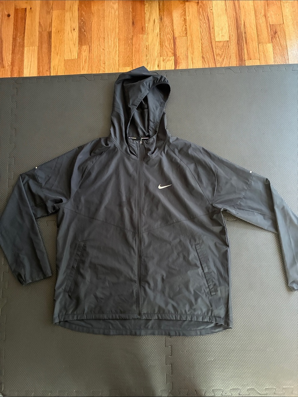 Nike Black Hooded Windbreaker with White Swoosh